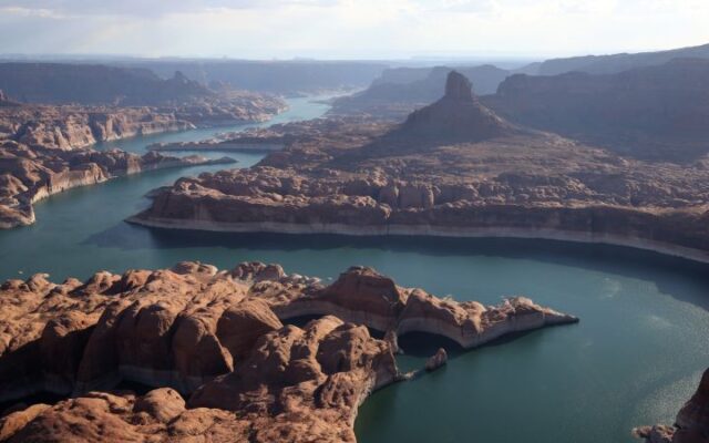 Not only is Lake Powell’s water level plummeting because of drought, its total capacity is shrinking, too