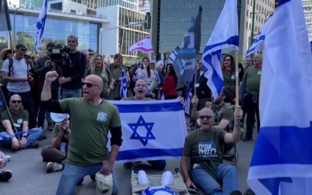 Israeli military veterans, a backbone of protest movement, vow to keep demonstrating