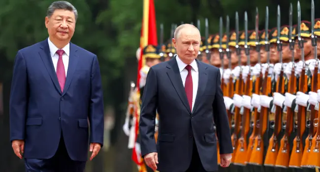 Putin, Xi Hail ‘Unyielding’ Ties In Talks After Trump Visit