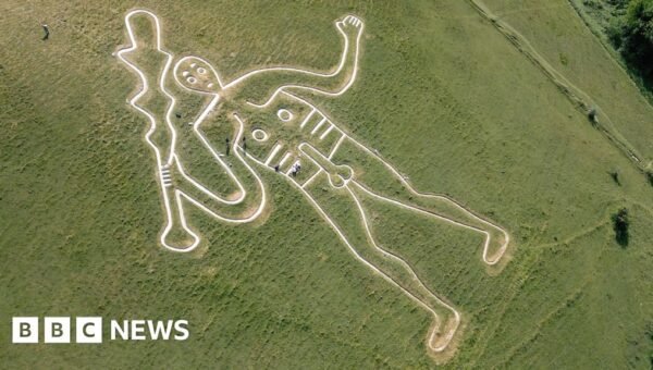 UK’s rudest chalk figure gets a glow-up to stop it fading in the rain