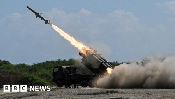 Japan defence minister denies militarism, criticises China’s ‘huge arsenal’