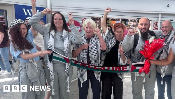 Seven flotilla activists detained in Israel arrive back in UK
