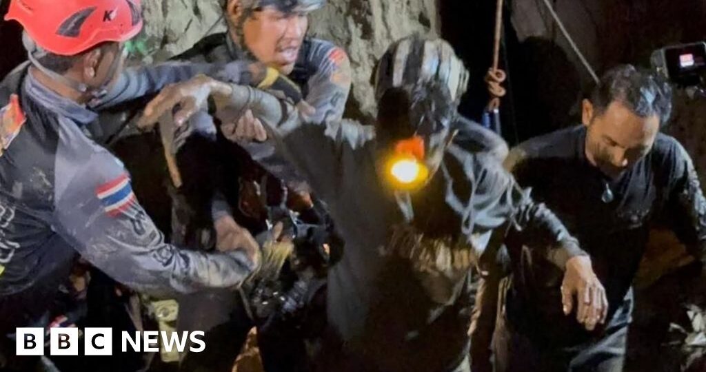 First of five men found alive in flooded Laos cave rescued