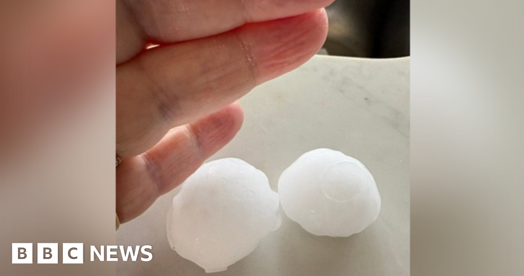 'Golf ball-sized' hailstones damage roofs and cars