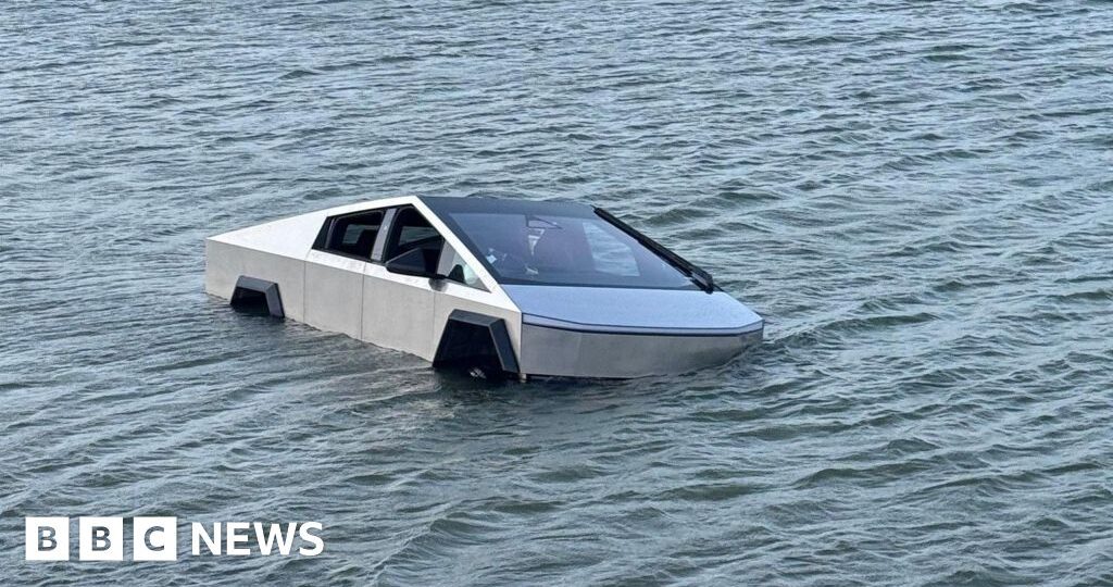 Tesla Cybertruck driver arrested after driving into lake to use ‘wade mode’, police say
