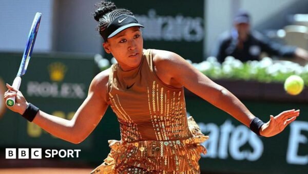 Osaka sparkles in golden French Open outfit