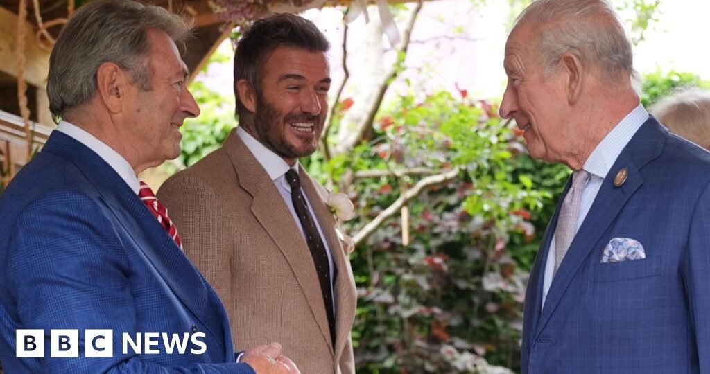 King all smiles as he meets David Beckham at Chelsea Flower Show