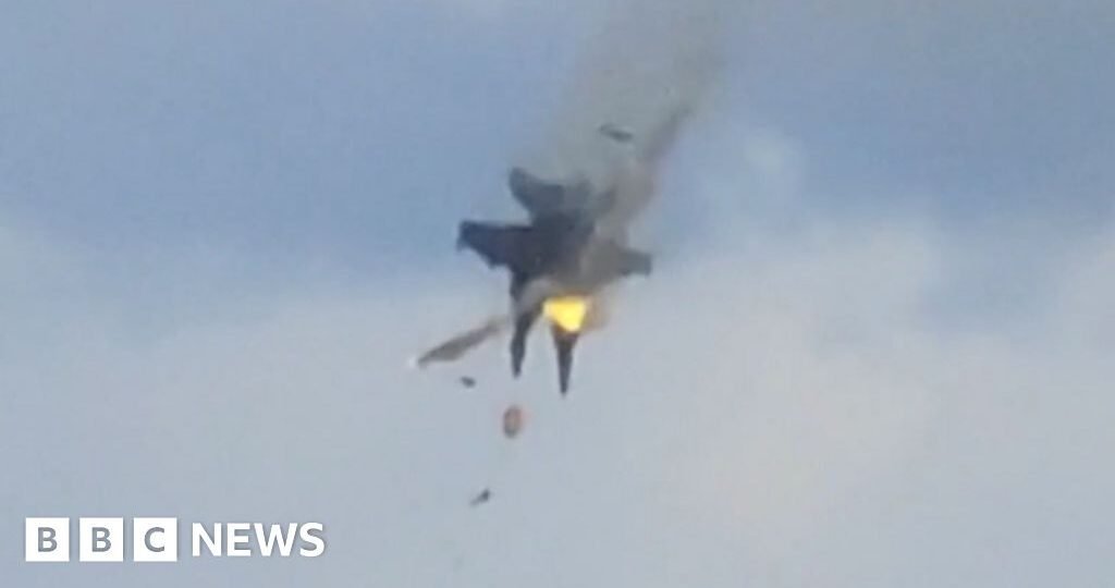 Moment two fighter jets collide mid-air at US air show
