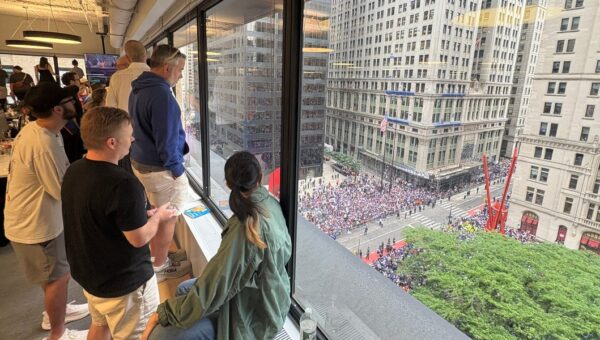 The hottest office perk in NYC today: a front-row view of the Knicks parade