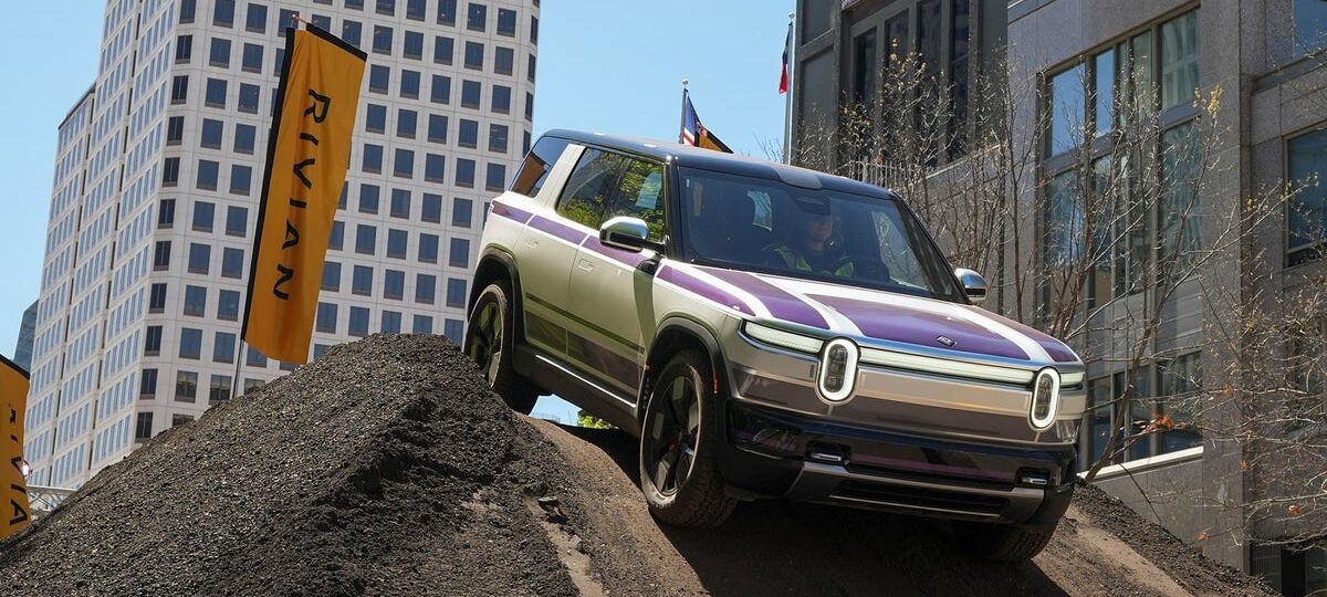 RJ Scaringe said there are 2 big reasons Rivian's new R2 doesn't look like a Tesla Model Y dupe