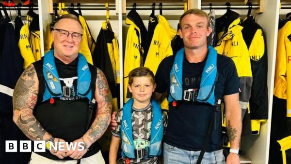 Boy, 8, helps save grandad after capsized kayak drifts two miles off coast