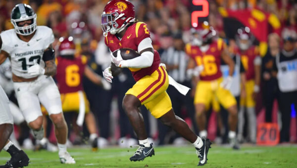 USC running back Waymond Jordan throws out first pitch at Yankees game