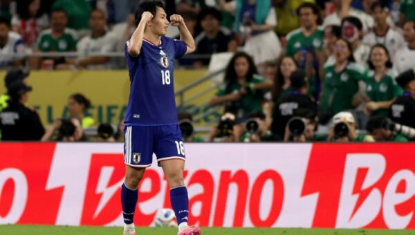 Japan stroll to victory over Tunisia in World Cup's 1,000th game