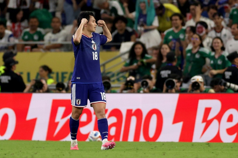Japan stroll to victory over Tunisia in World Cup’s 1,000th game