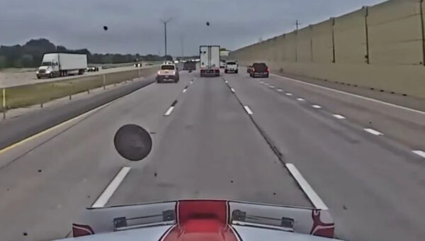 NASCAR hauler hits runaway wheel, releases dash cam footage of traffic incident