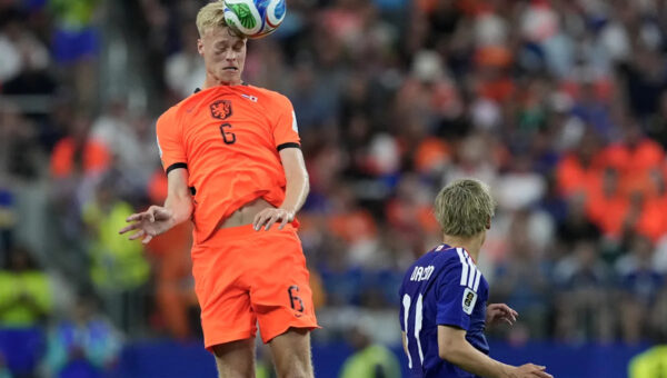 Tottenham signs Netherlands center back Jan Paul van Hecke from Brighton