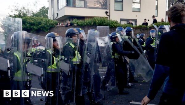 Six charged with violent disorder after Nowak protest