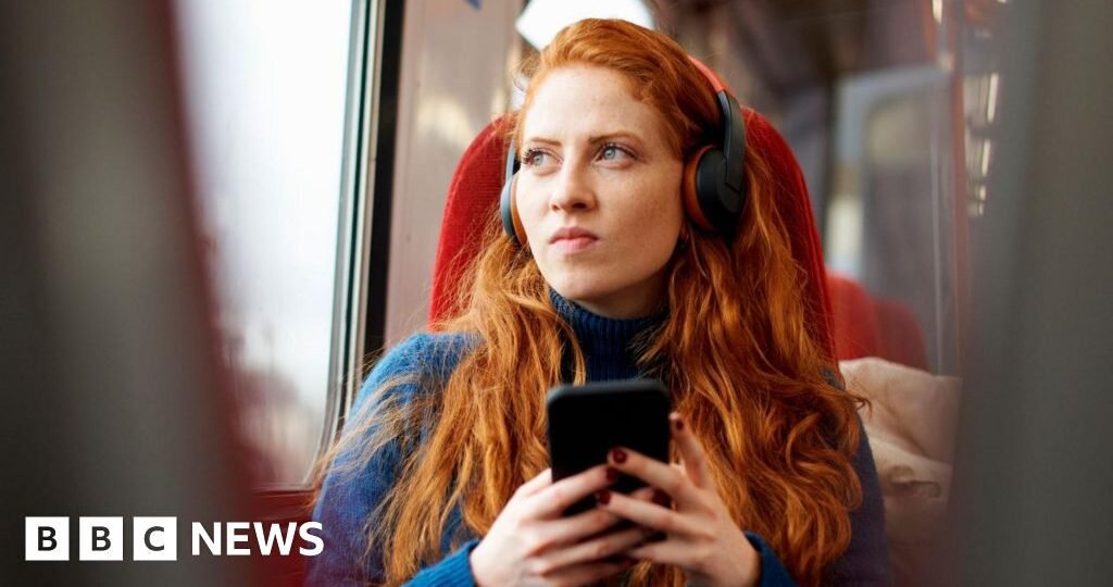 Companies and local authorities must improve mobile signals on trains, Ofcom says