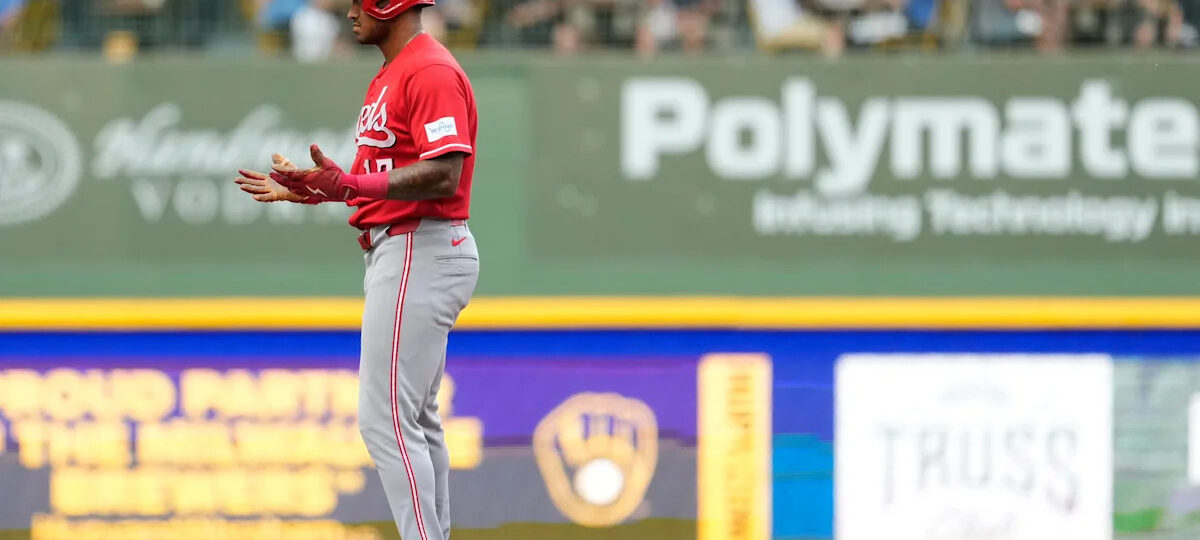 Reds Dane Myers carted from field after crashing into wall