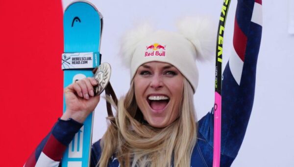 Lindsey Vonn proudly reveals surgery scars in white bikini following Olympic accident