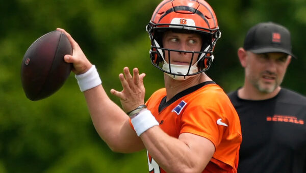 Bengals restructure Joe Burrow's contract to free up cap space, AP source says