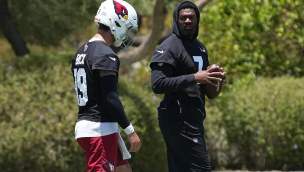 Quarterback Jacoby Brissett reports to Cardinals' mandatory camp, though future remains unclear