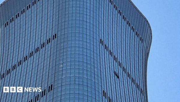 A plane crashed into a tower in Beijing but China is not saying what happened