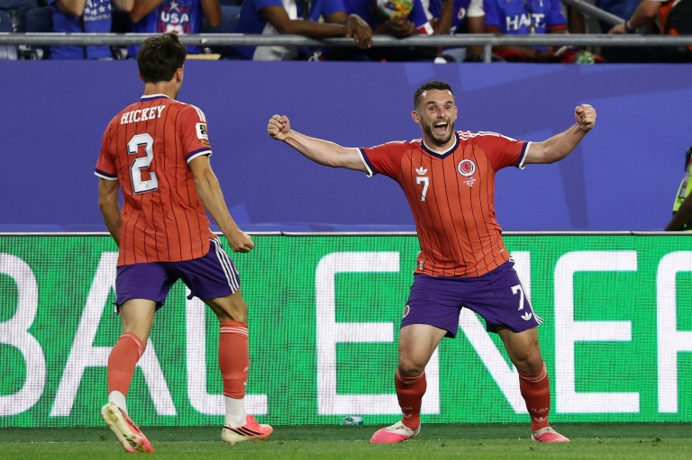 McGinn gives Scotland win over Haiti on World Cup return