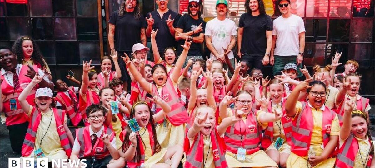 Pupils perform for Foo Fighters in stadium show