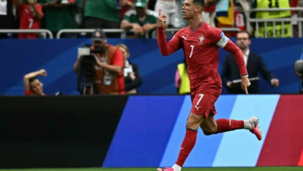 Ronaldo double fires Portugal, England eye last 32