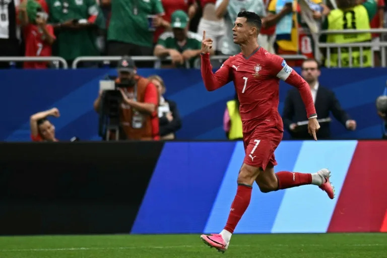 Ronaldo double fires Portugal, England eye last 32