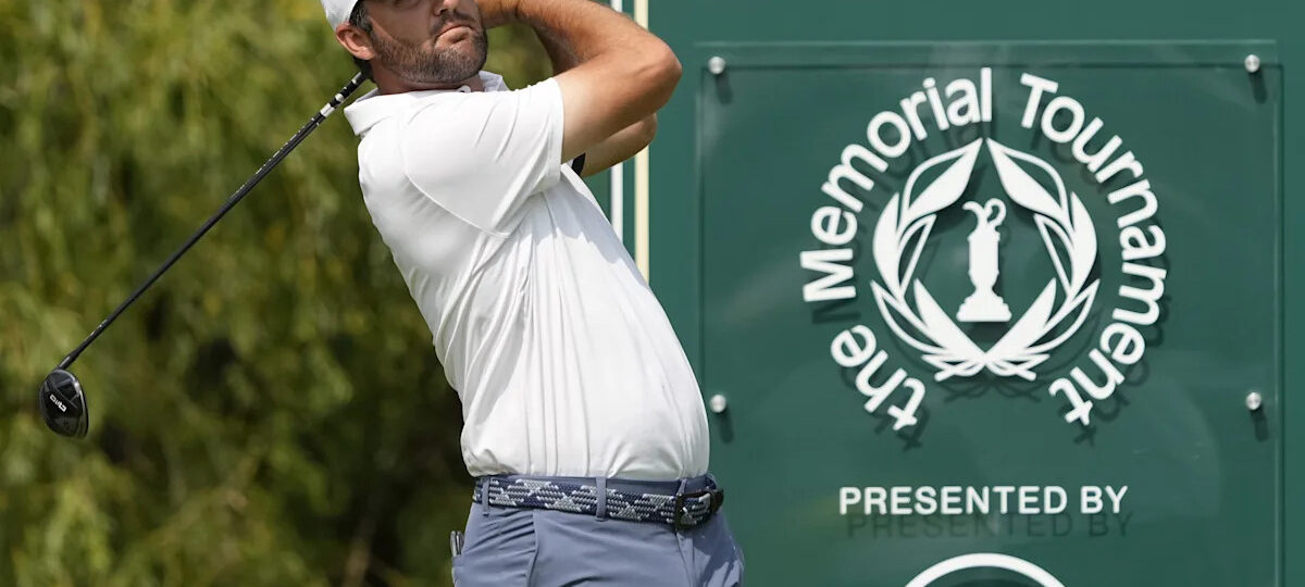 Who is leading the Memorial Tournament PGA Tour event on Sunday?