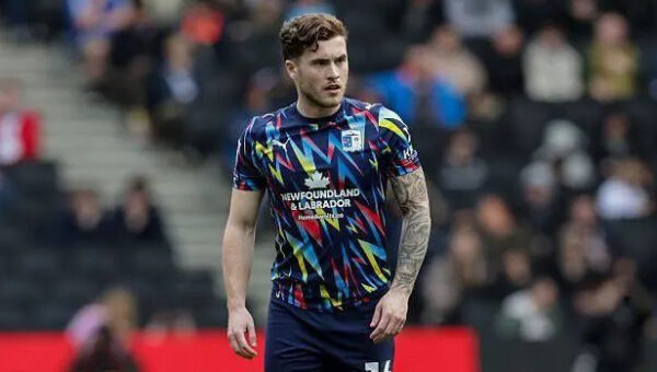 Cheltenham sign midfielder McCann from Barrow