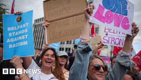 Thousands gather for anti-racism rally in Belfast after disorder