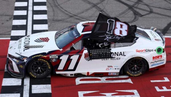 Denny Hamlin used unique flag to pay tribute to Kyle Busch after FireKeepers Casino 400