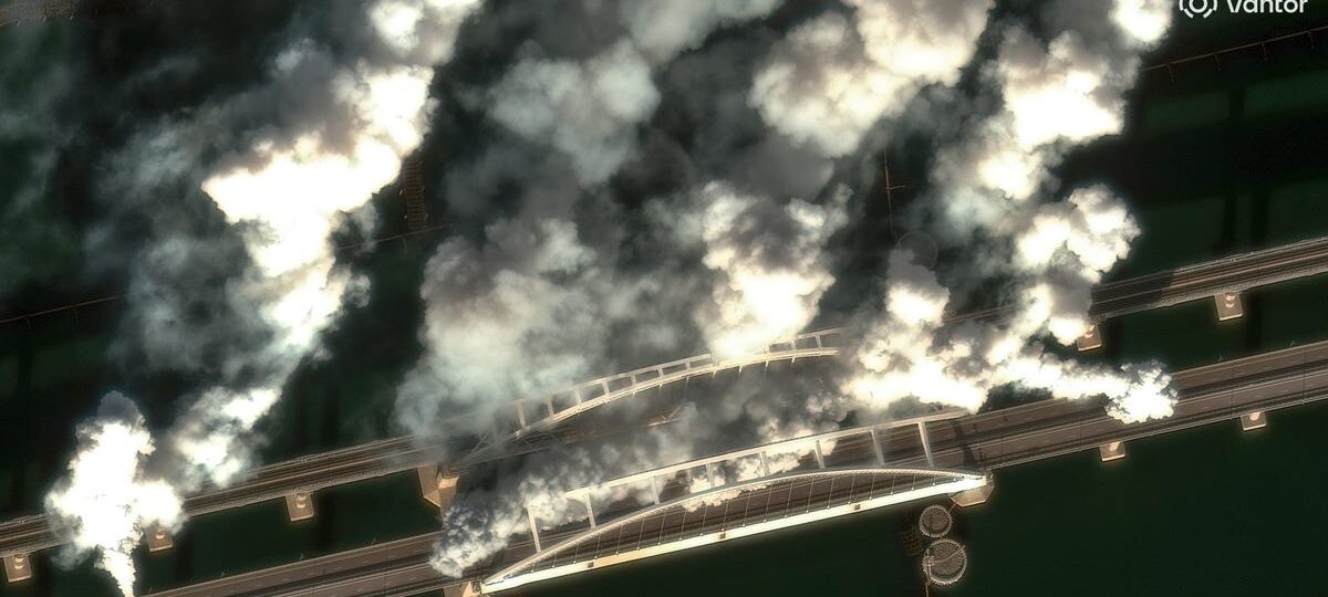 Satellite images show Russian forces throwing up smoke screens on a key Crimean bridge as Ukrainian drones target supply lines