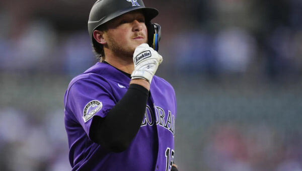 The Rockies fly the W, outhit the Cubs en route to a 7-3 victory