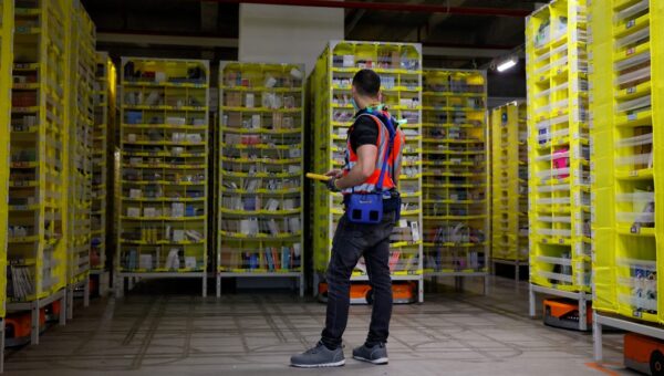 Amazon is on a mission to optimize warehouse work. Its latest test puts wearable devices on support staff.
