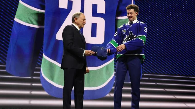 Inside Malhotra family tree: How Canucks paired son Caleb with head coach dad Manny on NHL Draft day