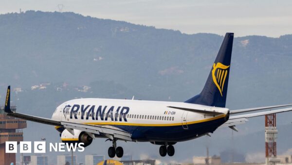 Ryanair investigated over charging parents to sit with children
