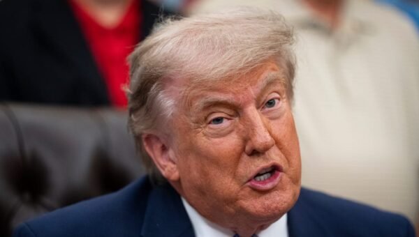 Trump privately signs scaled-back AI executive order that cuts down a voluntary review period
