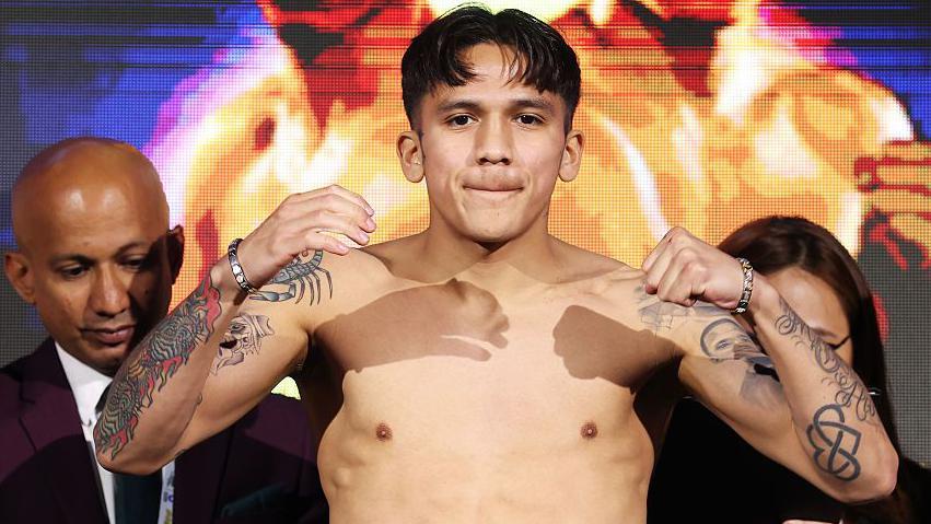 Rodriguez becomes three-weight world champion
