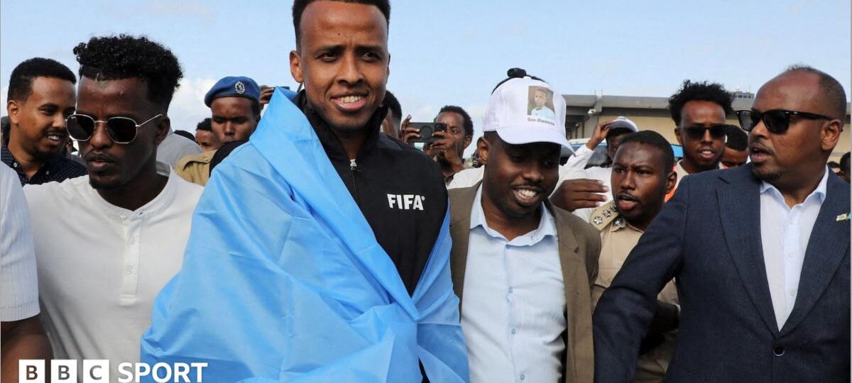 World Cup referee denied US entry arrives home to hero's welcome in Somalia