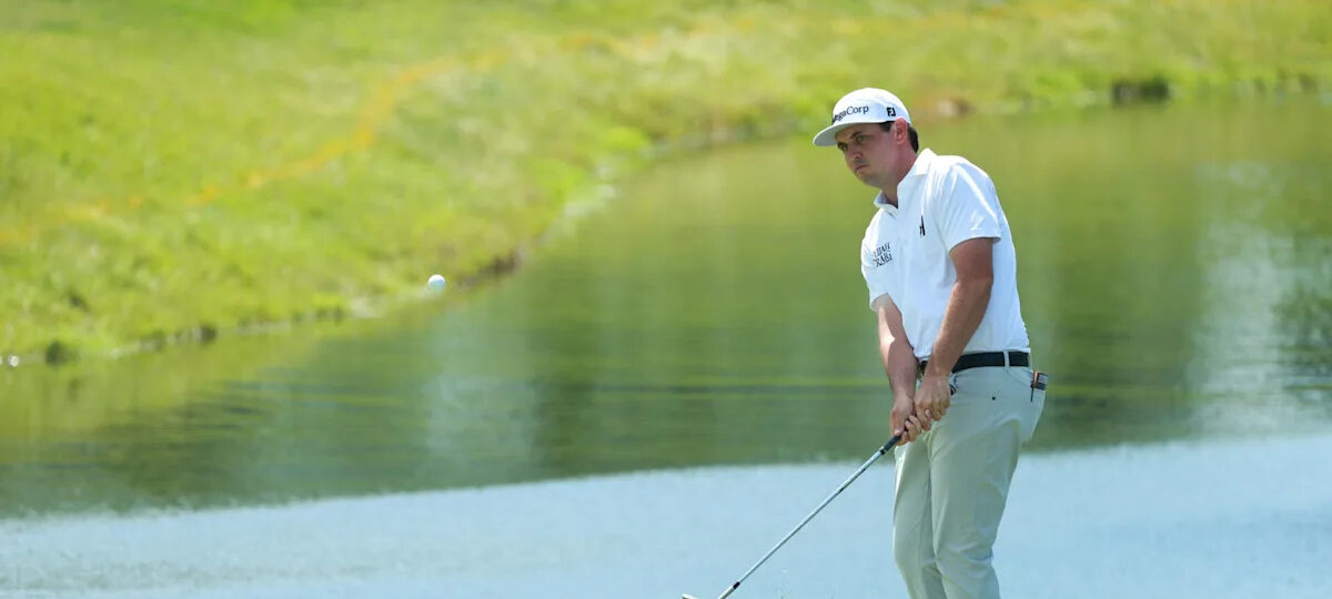 J.T. Poston handles the wind at Memorial for low round of tournament and the lead