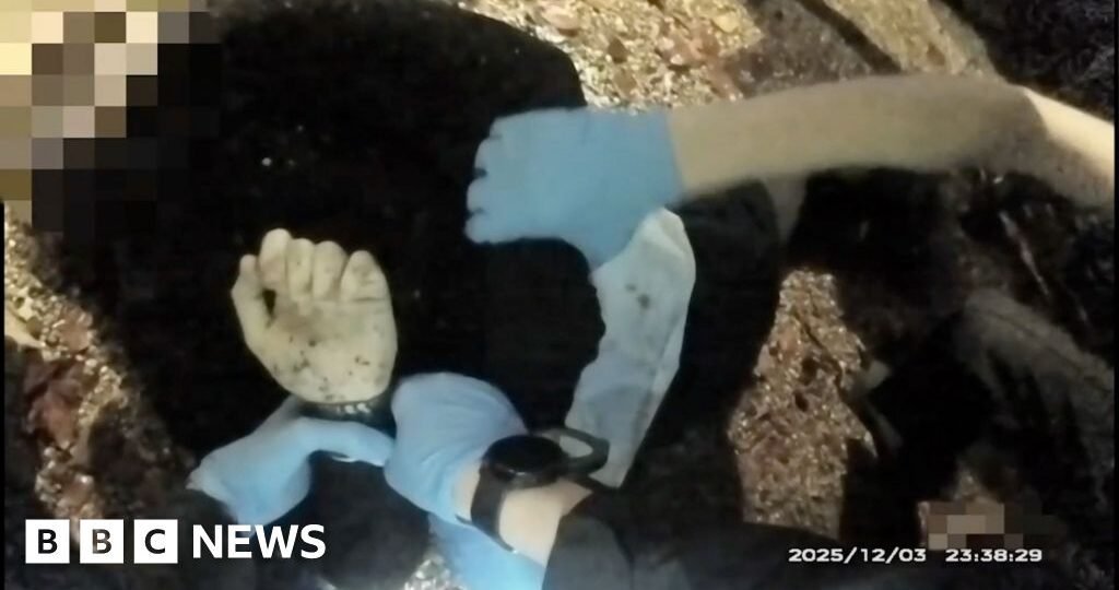 Police bodycam shows officers handcuffing stabbed student as he lay dying