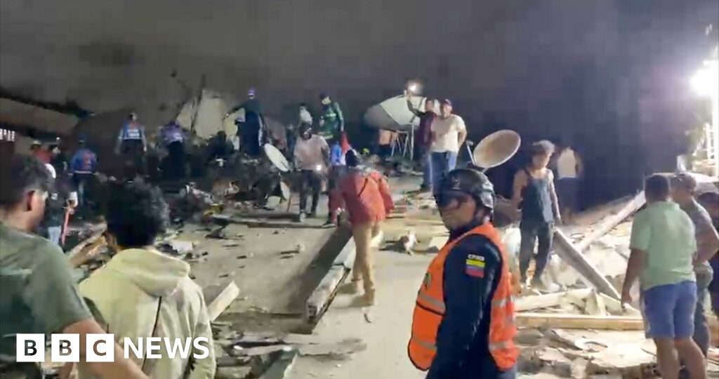 Venezuelan rescuers search through building rubble for survivors