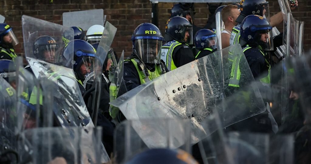 Watch: Protesters and riot police clash near home of Henry Nowak's killer