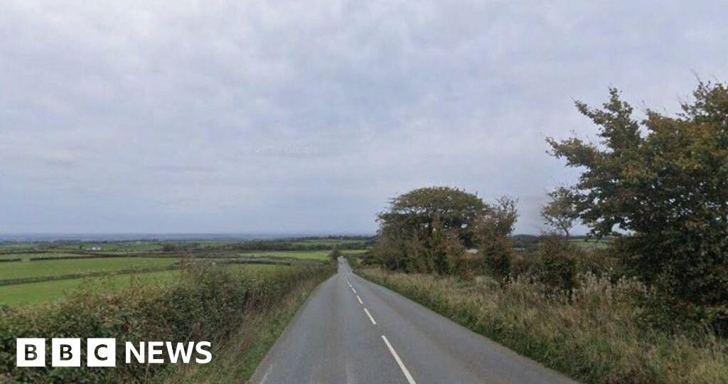 Helicopter crashes into field in Devon