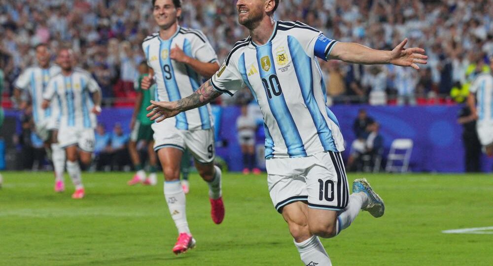 Messi dazzles to equal World Cup scoring record as Argentina breeze past Algeria