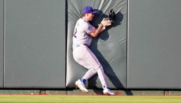 33-34 – Rangers survive bruising battle in KC, win 6-4 in 10